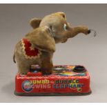 A tin plate Jumbo The Bubble Blowing Elephant toy. 18 cm high.