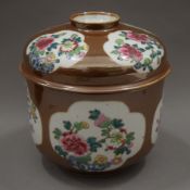 A Chinese porcelain cafe au lait ground pot and cover. 18 cm high.