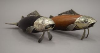 A pair of white metal mounted salt and pepper grinders formed as fish. 23 cm long.