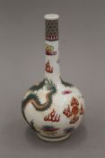 A small Chinese porcelain dragon vase. 16 cm high.