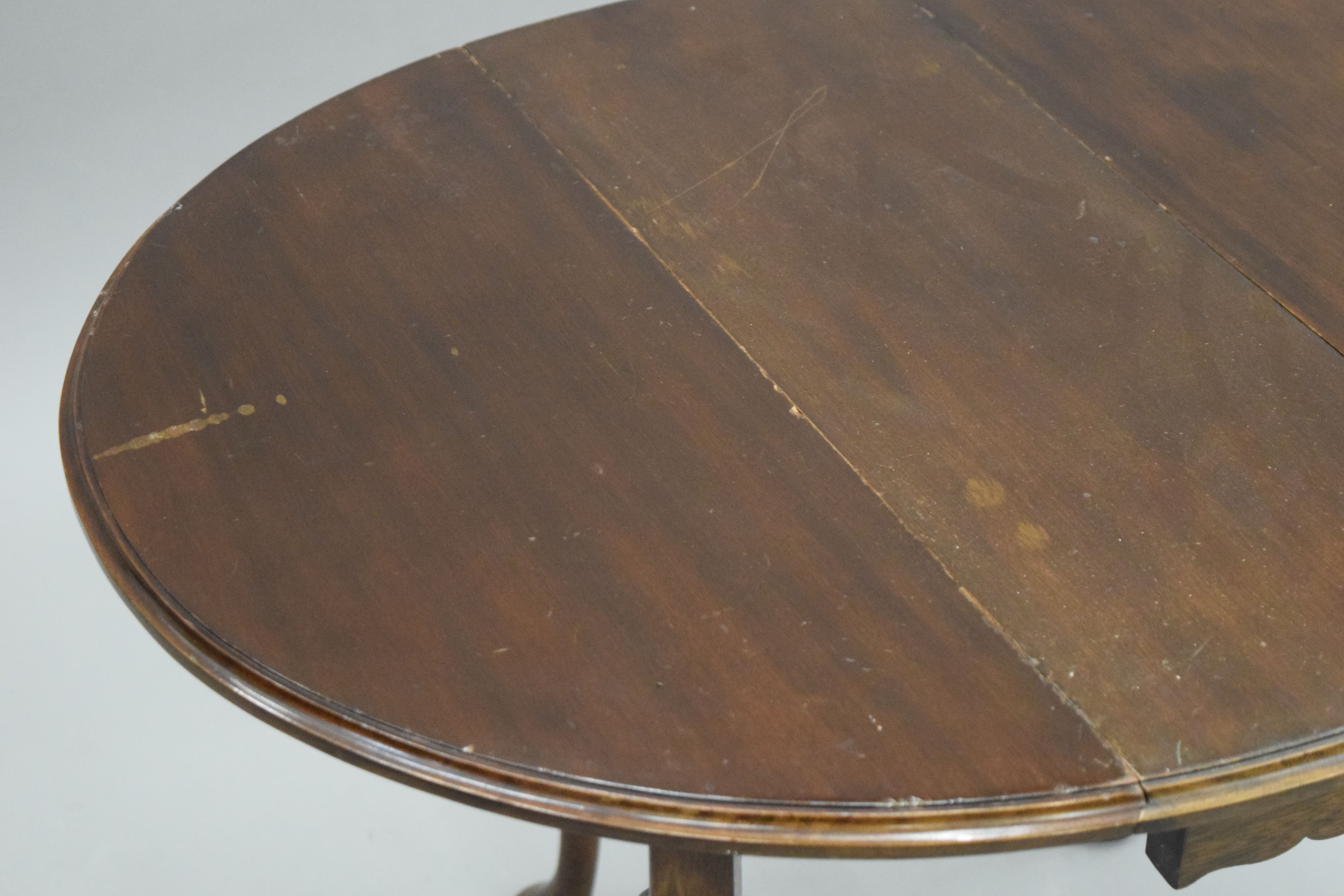 A small early 20th century mahogany drop leaf table. 59.5 cm long. - Image 5 of 5