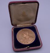 A 1911 Coronation medallion, cased.