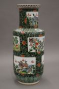 A Chinese porcelain famille verte vase. 48 cm high.