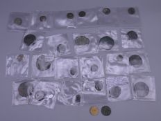 A collection of various Roman coins, etc.
