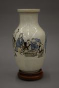 A Chinese crackle ware pottery vase hand painted with figures in various pursuits,