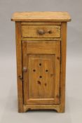 A 19th century pine pot cupboard. 42.5 cm wide.