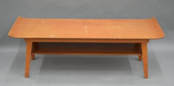 A mid-20th century coffee table. 110.5 cm long.