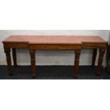 An early 19th century mahogany serving table with replaced top. 245 cm wide.