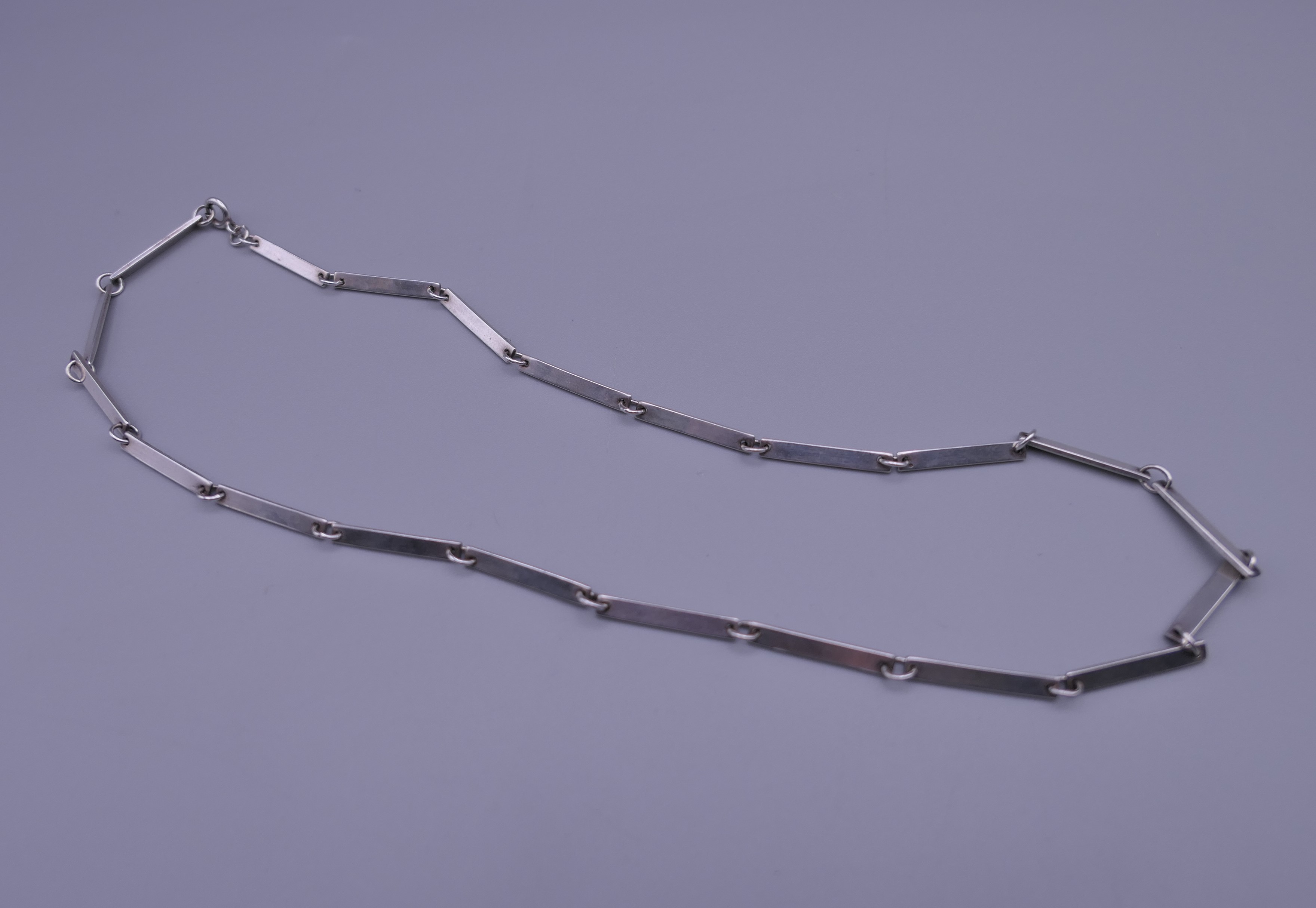 A Contemporary silver necklace and earrings en-suite. The necklace 46 cm long. - Image 4 of 7