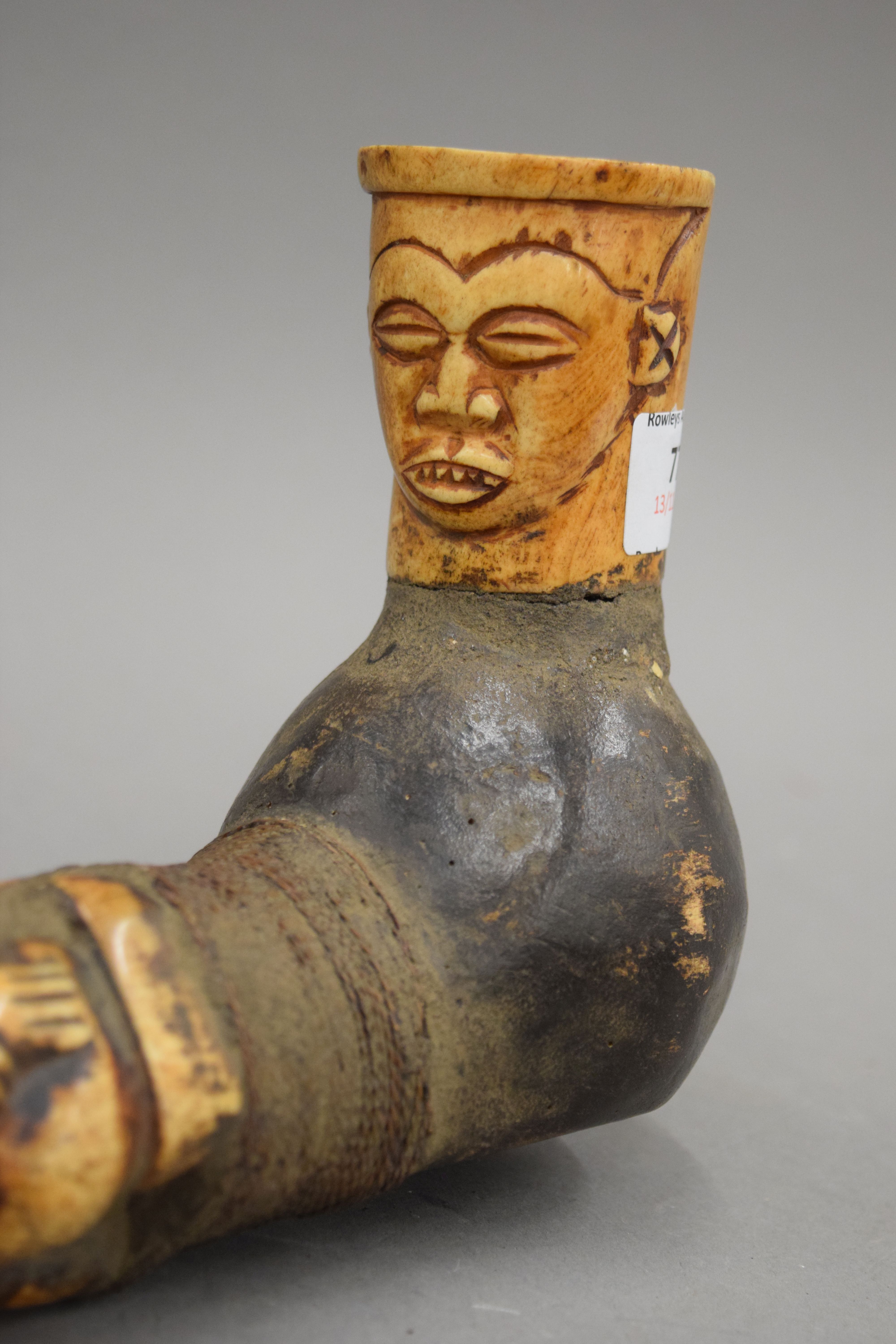 Two African carved bone and wooden pipes. The largest 34.5 cm long. - Image 2 of 10