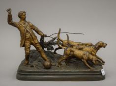 ALFRED DUBUCAND (1828-1894) French, a gilt and patinated bronze hunting dog group, signed.