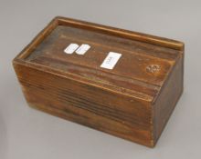 A Victorian pitch pine hymns number card box. 25 cm long.
