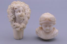 Two finely carved 19th century ivory studies of children's heads, possibly seal terminals.