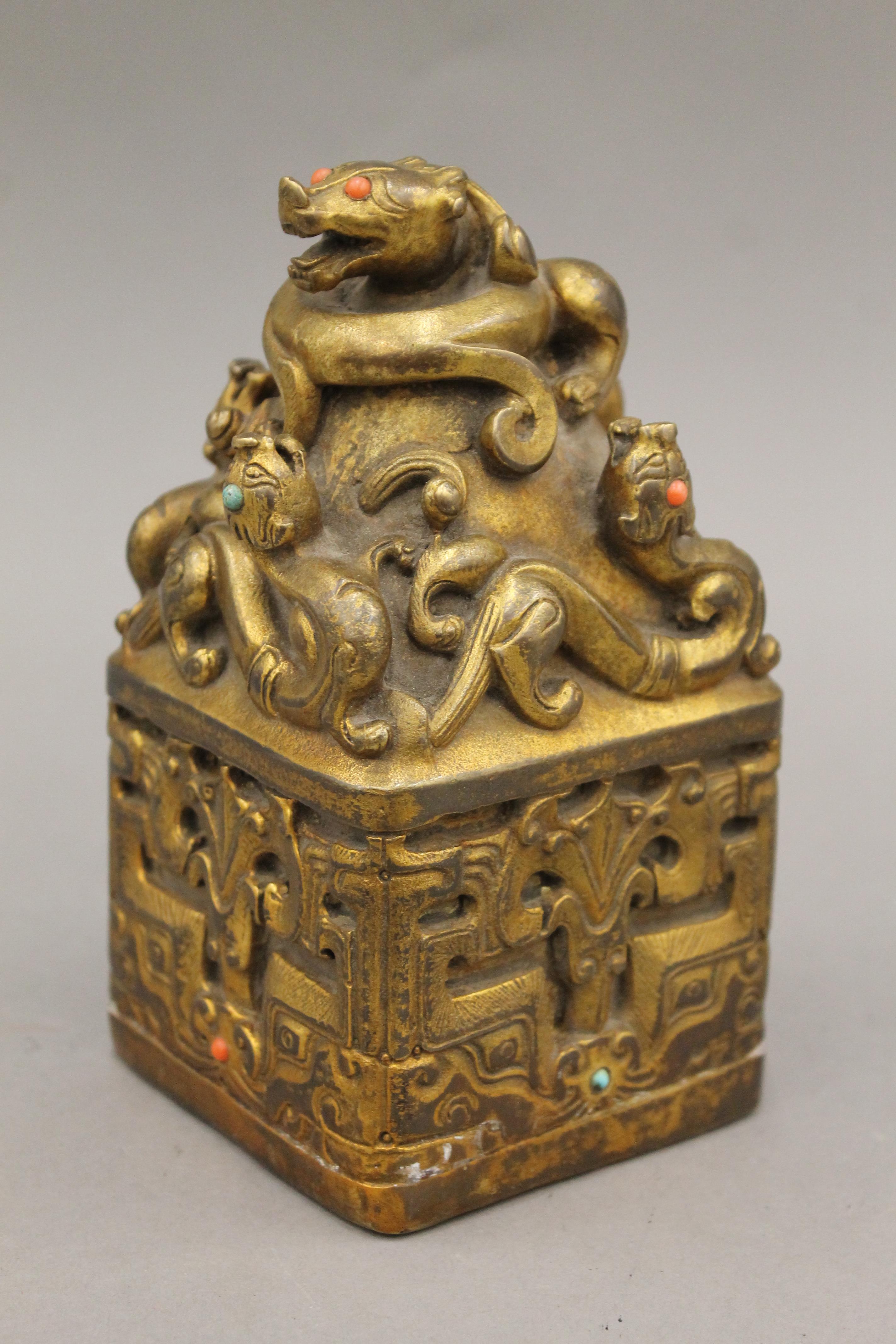 A large Chinese gilded bronze square seal with turquoise and red coral stones. 16.5 cm high. - Image 2 of 4