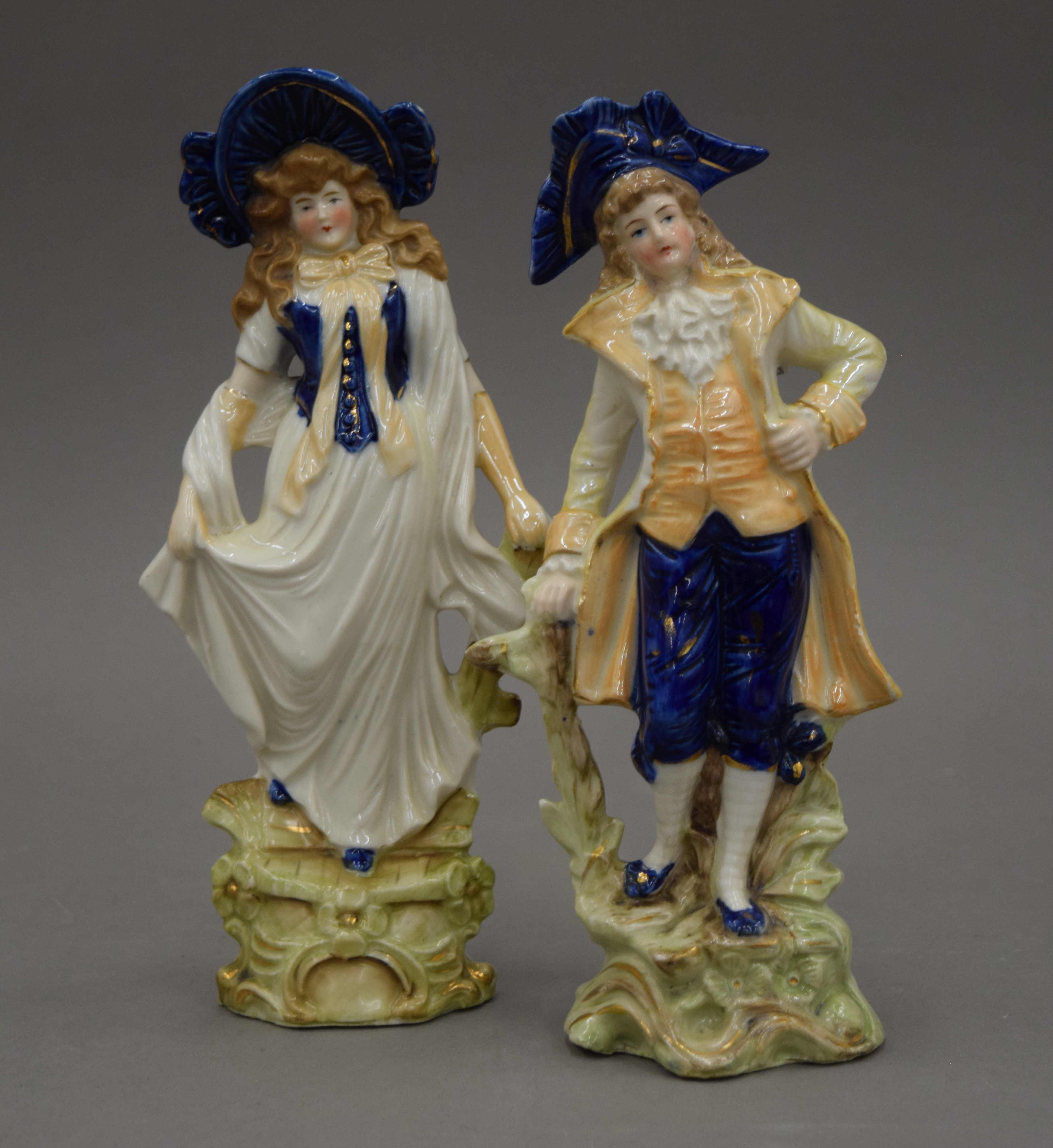 A pair of Continental porcelain figures together with a pair of 19th century candlesticks of - Image 9 of 14