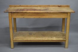 A vintage pine serving table. 150 cm wide.