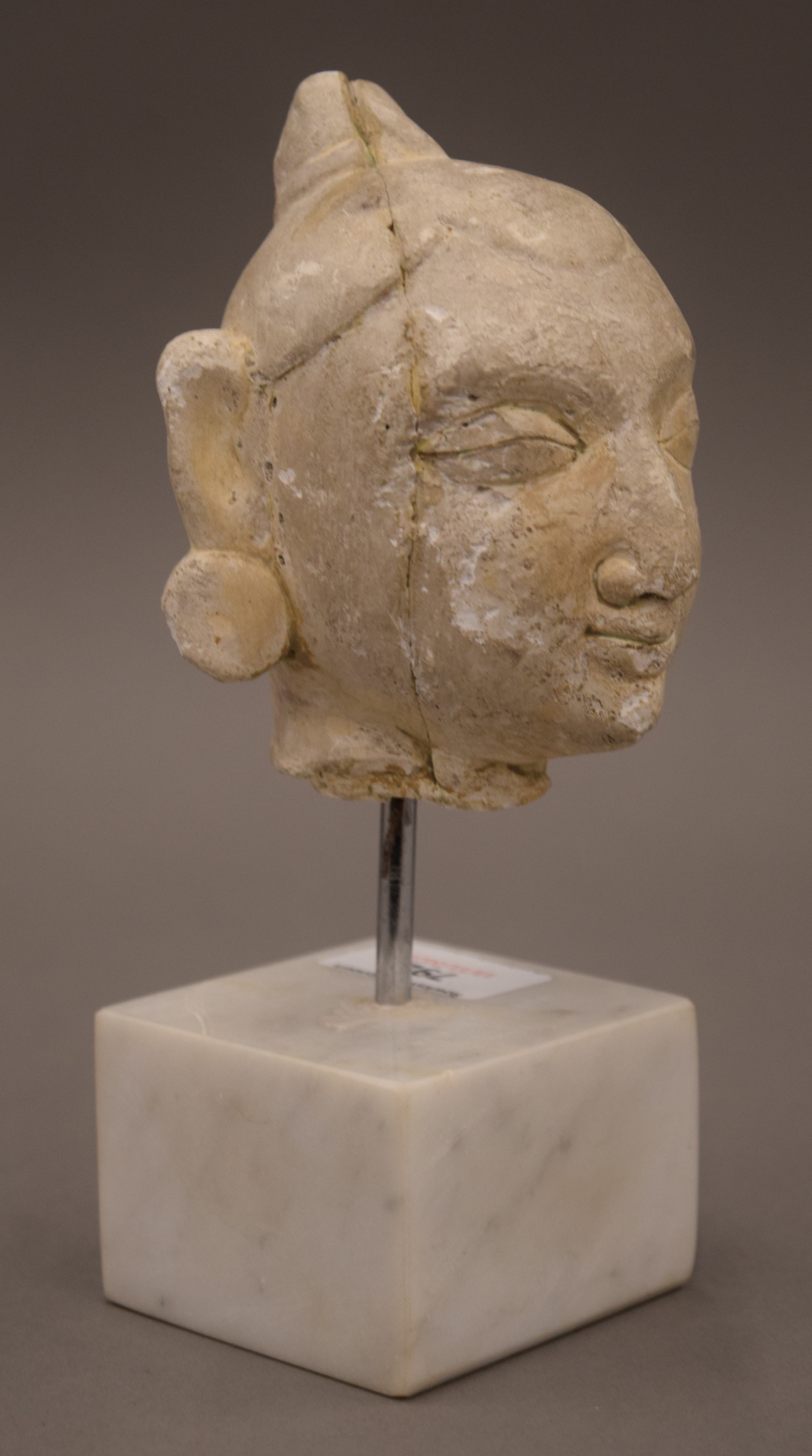 An Indian plaster bust mounted on white marble base. 20 cm high overall. - Image 2 of 4