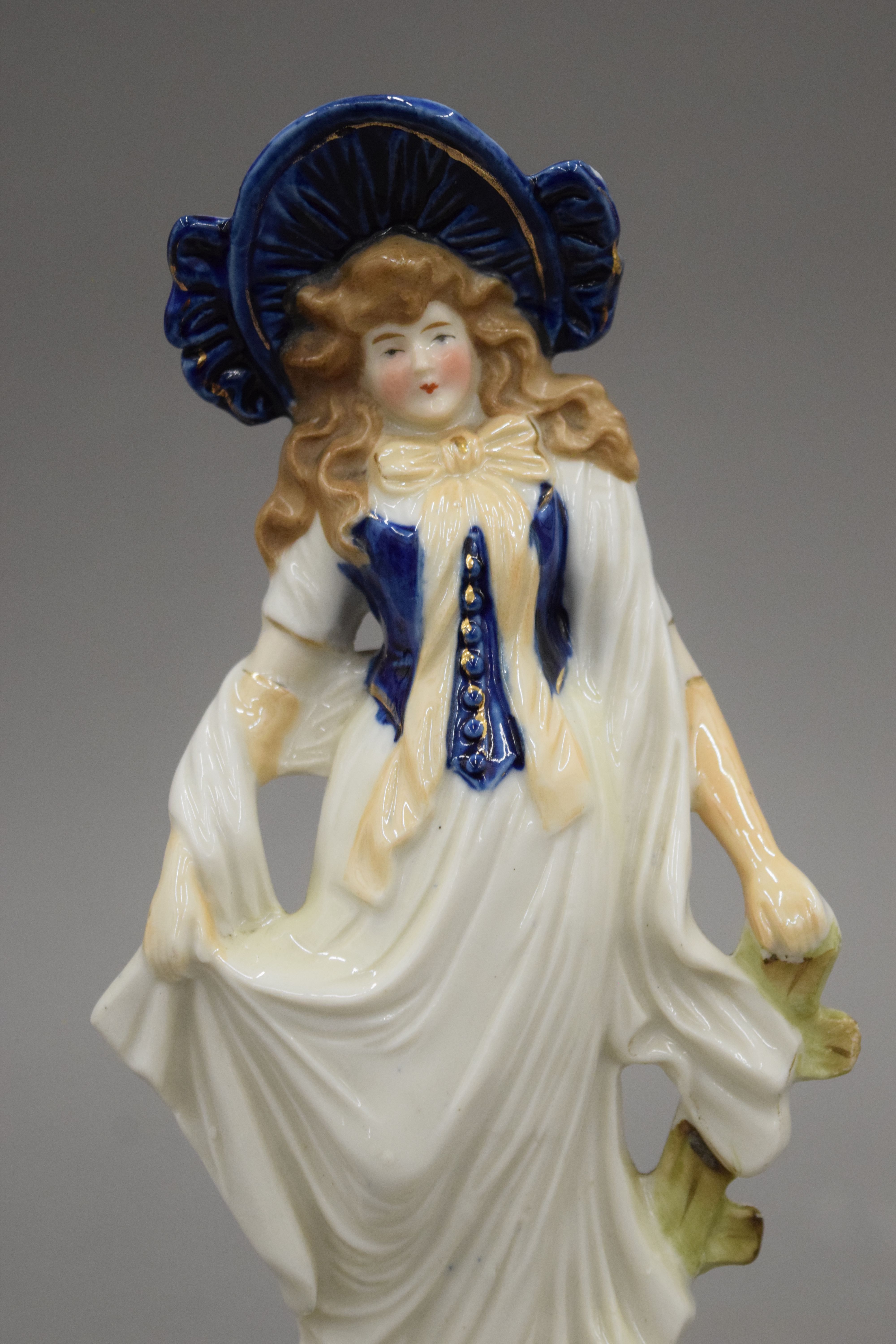A pair of Continental porcelain figures together with a pair of 19th century candlesticks of - Image 11 of 14