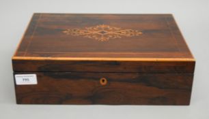 A 19th century French inlaid rosewood box. 32 cm wide.