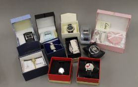 A quantity of wristwatches and costume jewellery.