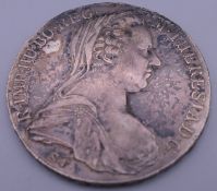 A silver Theresia coin.