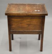 A vintage oak sewing box. 50 cm wide.