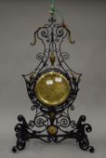 A late 19th/early 20th century French brass faced clock,