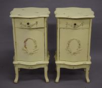 A pair of yellow painted bedside cupboards. 40 cm wide.