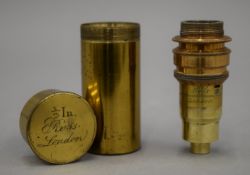 A cased Ross of London 1/2 inch microscope objective lens. 7 cm high.