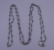 A long guard chain. Approximately 138 cm long.