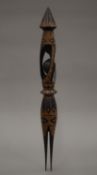 A carved tourist piece cannibal fork. 46 cm long.