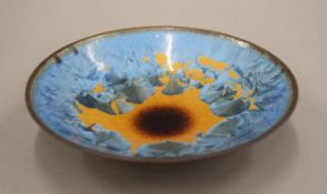 A Studio pottery bowl with enamel glaze decoration. 16 cm diameter.