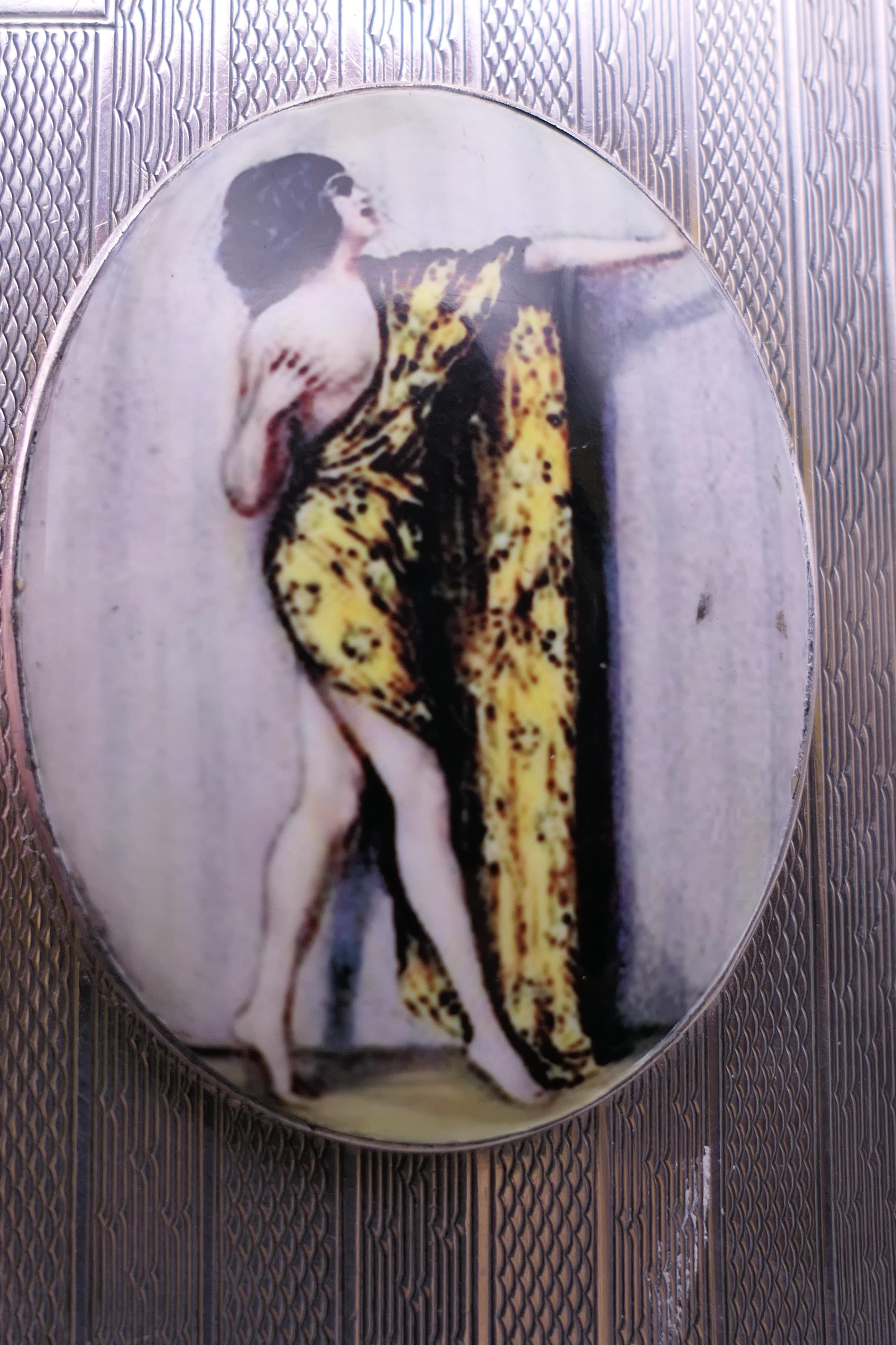 A silver cigarette case decorated with a scantily clad lady. 7 cm wide. - Image 8 of 9