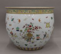 A Chinese porcelain planter. 39.5 cm diameter.