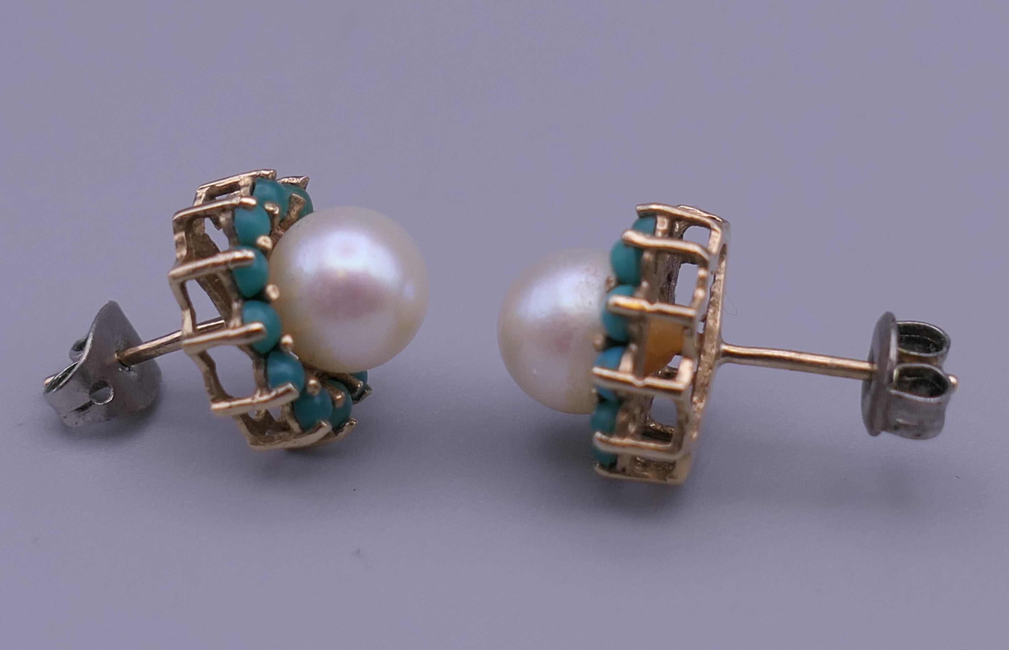 A pair of 9 ct gold turquoise and pearl earrings, each with replaced silver backs. 1 cm diameter. - Image 2 of 6