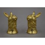 A pair of gilt cruets formed as hares. 6.5 cm high.