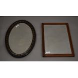 Two bevelled mirrors. The largest 77.5 cm long.