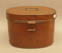 A Victorian tin hat box. 38 cm wide.