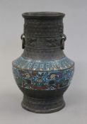 A late 19th/early 20th century Chinese cloisonne decorated bronze vase. 21 cm high.