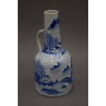 An 18th century Chinese blue and white porcelain ewer. 25 cm high.