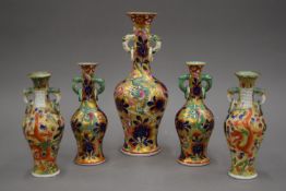 Five Masons Rone pattern vases. The largest 25 cm high.