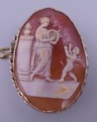 A Victorian unmarked gold framed cameo brooch. 5.5 cm high.