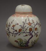 A Chinese painted porcelain ginger jar. 19 cm high.