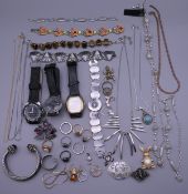 A bag of costume jewellery, watches, etc.