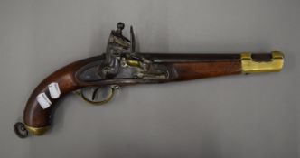 A large 19th century flintlock pistol. 43 cm long.