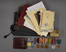 A quantity of militaria and ephemera.