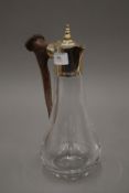 An antler handled silver plate mounted glass claret jug. 29.5 cm high.