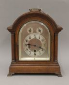 A late 19th/early 20th century oak cased mantle clock. 39 cm high.