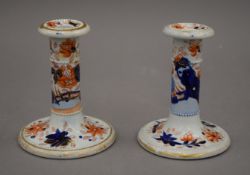 A pair of Ironstone candlesticks. 11 cm high.