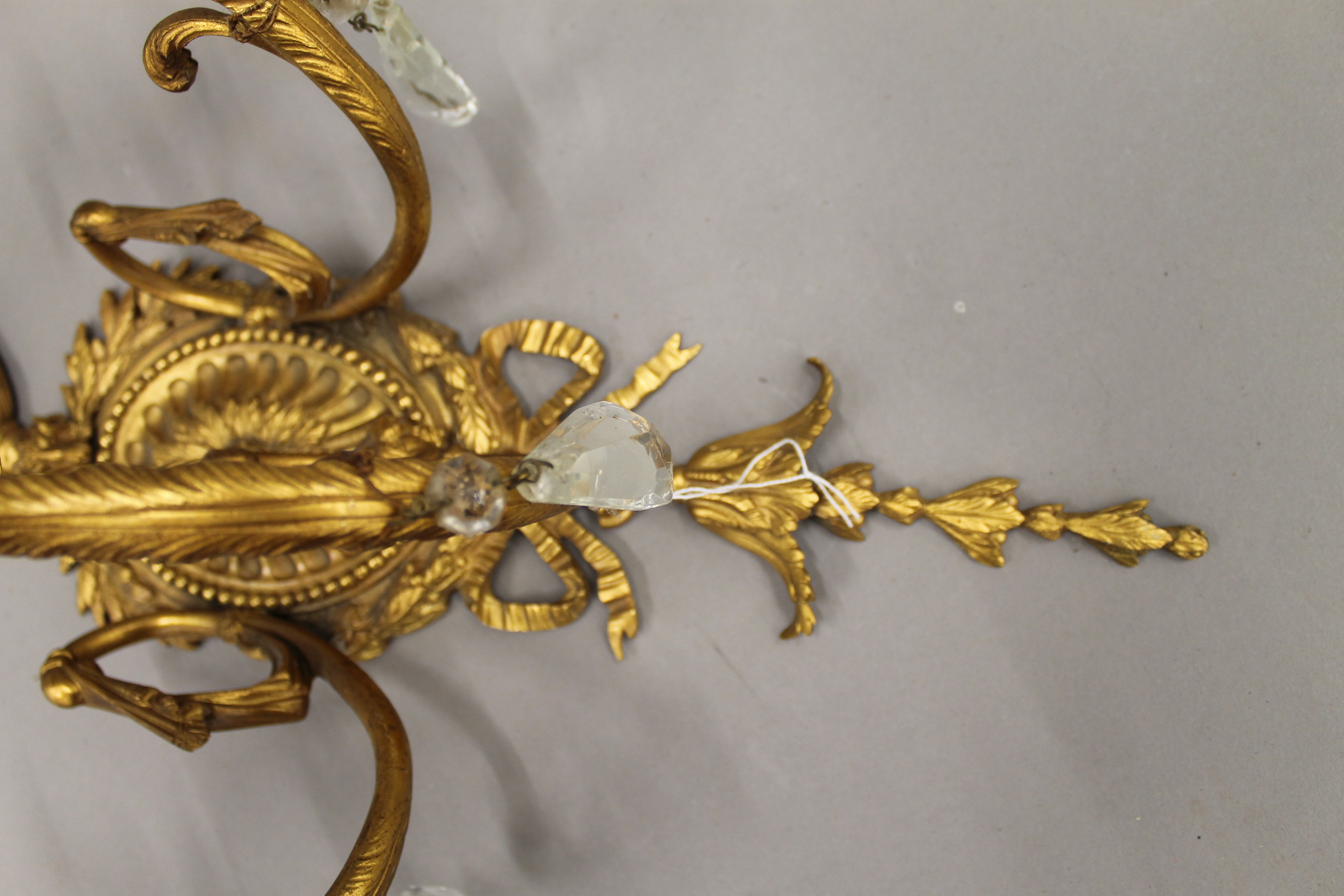 A pair of ormolu three-branch wall lights. 68 cm high. - Image 4 of 5